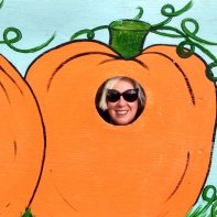 Poking my face out of a pumpkin at Castle Hill Farm
